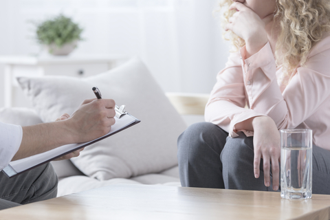 The picture shows a women treated for obsessive-compulsive disorder