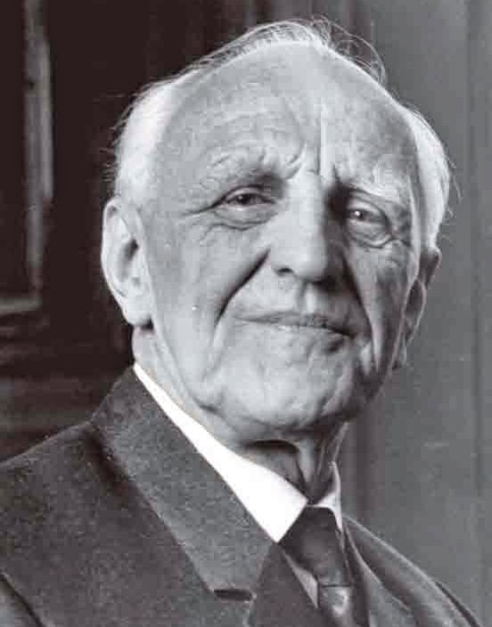 The black and white picture shows PTSD researcher Donald Winnicott a British pediatrician and psychoanalyst. He worked with traumatized children and developed the theoretical basis for the PTSD treatment