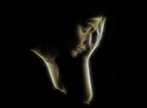 Dysthymia (Persistent Depressive Disorder). The picture shows a profile of a depressed young women